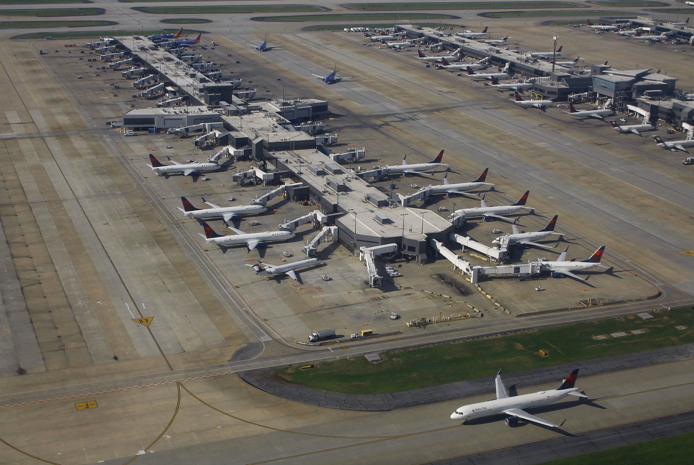 Aerial view of Concourse C at Hartsfield-Jackson Atlanta International Airport, the airport complex inside Clayton County that employs more than 56,000 workers.