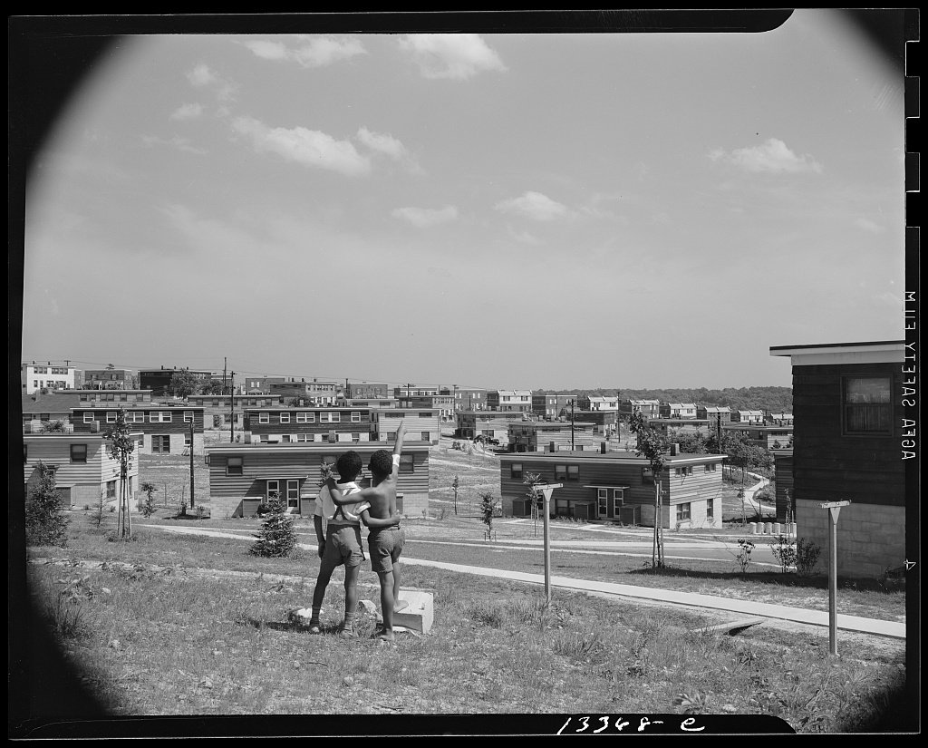 Boys overlooking the Frederick Douglass housing project in Anacostia, Washington, D.C., June 1942.